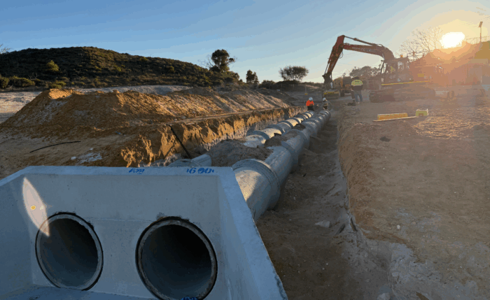 REMC | Ricciardo Earthmoving onsite in two rocks installing drainage