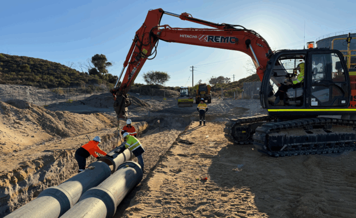 REMC Ricciardo Earthmoving installing drainage with an excavator at Two Rocks project